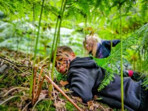 TRIBE Bushcraft child adventure day session camouflage and concealment 5