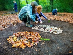 TRIBE Bushcraft child adventure day session children making leaf art 2