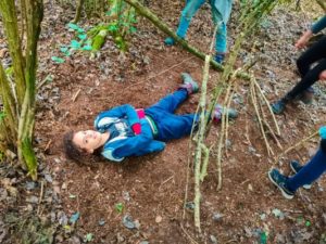 TRIBE Bushcraft child adventure day session measuring the size for a shelter