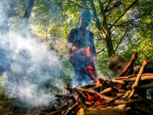 TRIBE Bushcraft child birthday party children building a fire