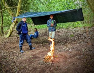 TRIBE Bushcraft home school education session camp challenge making a fire and putting up a shelter