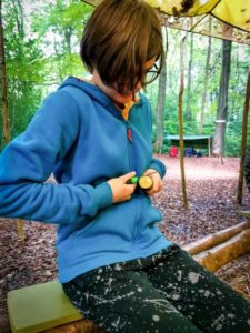 TRIBE Bushcraft home school education session child demonstrating the chest lever technique