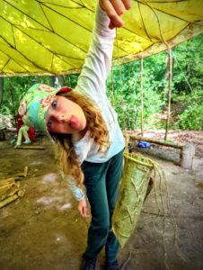 TRIBE Bushcraft home school education session child showing completed bark basket using hazel