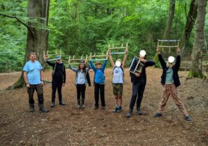 TRIBE Bushcraft home school education session children showing the completed buck saws