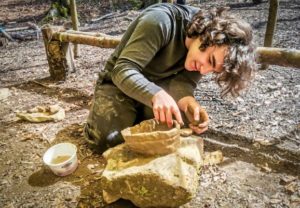 TRIBE Bushcraft home school education session making a clay pot from clay near camp