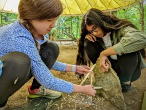 TRIBE Bushcraft summer holiday session making figure 4 traps 3 girls