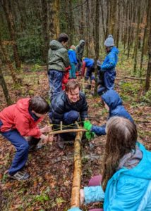 TRIBE Bushcraft home school education session processing a felled tree