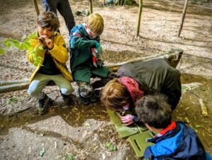 TRIBE Bushcraft scout group making things