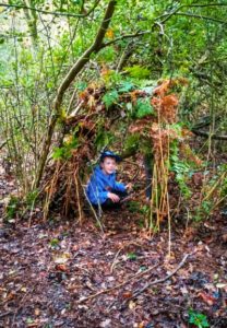 TRIBE Bushcraft session birthday party making shelters using natural materials