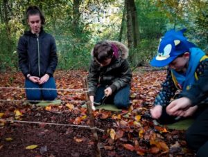 TRIBE Bushcraft session birthday party using a ferro rod to light a fire