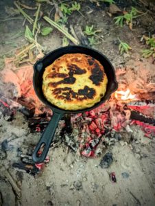 TRIBE Bushcraft session making bannock