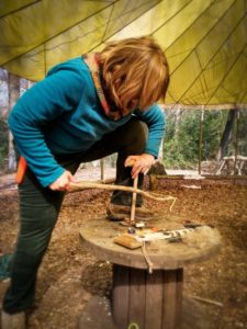 TRIBE Bushcraft session social saturdays family bushcraft adult trying the bow drill fire lighting method for the first time