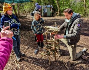 TRIBE Bushcraft session social saturdays family bushcraft building the stick tower