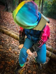 TRIBE Bushcraft session social saturdays family bushcraft child bending willow rod using knee