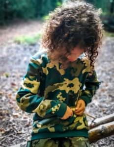 TRIBE Bushcraft session social saturdays family bushcraft child using advanced knife techniques