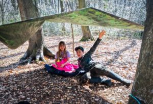 TRIBE Bushcraft session social saturdays family bushcraft children in the completed shelter