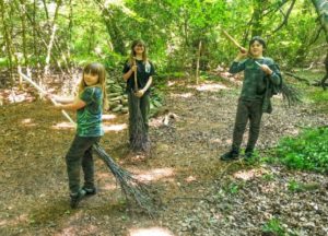 TRIBE Bushcraft session social saturdays family bushcraft completed besom brooms being demonstrated by children