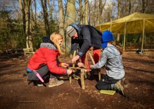 TRIBE Bushcraft session social saturdays family bushcraft constructing a stick tower 1