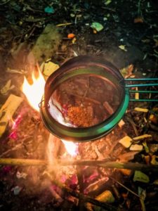 TRIBE Bushcraft session social saturdays family bushcraft making popcorn over the fire with sieves