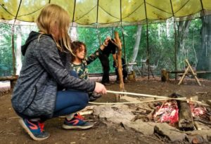 TRIBE Bushcraft session social saturdays family bushcraft straightening arrow shafts