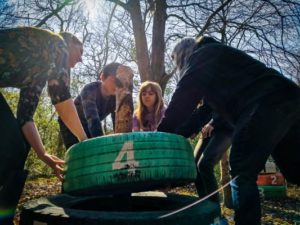 TRIBE Bushcraft session social saturdays family bushcraft team building tyre game