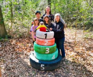 TRIBE Bushcraft session social saturdays family bushcraft team building tyre game completed