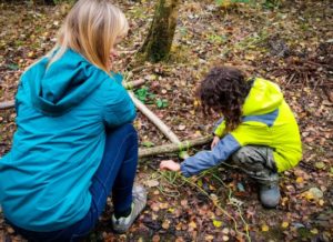 TRIBE Bushcraft session social saturdays family bushcraft tying sticks together to make a stick hammock 1