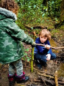 TRIBE Bushcraft session social saturdays family bushcraft tying the handrail for the bridge 2