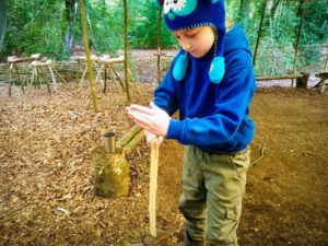 TRIBE Bushcraft session social saturdays family bushcraft using the hand batoning technique