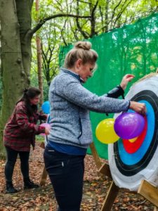 TRIBE Woodland Archery attaching balloons to the targets