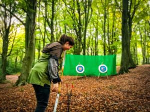 TRIBE Woodland Archery ready to shoot the arrow towards the target